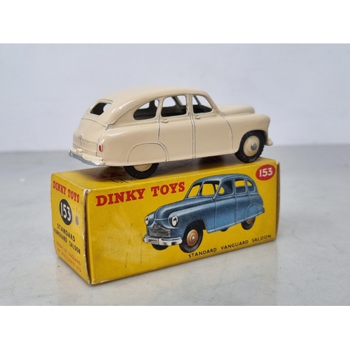 1204 - A boxed Dinky Toys No.153 cream Standard Vanguard Saloon, Nr M-M, box Ex