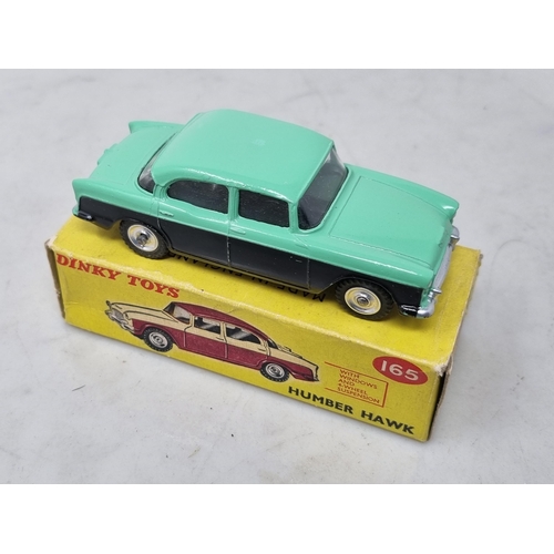 1216 - A boxed Dinky Toys No.165 scarcer green and black Humber Hawk with green roof and number plate casti... 