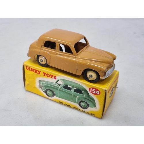 1222 - A boxed Dinky Toys No.154 tan Hillman Minx, Nr M-M, box VG-Ex