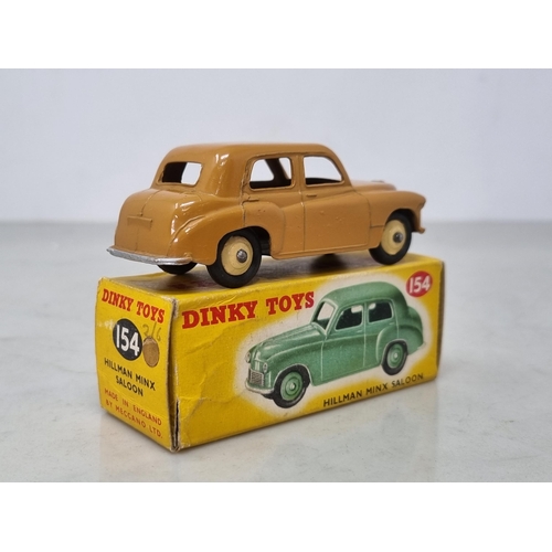 1222 - A boxed Dinky Toys No.154 tan Hillman Minx, Nr M-M, box VG-Ex