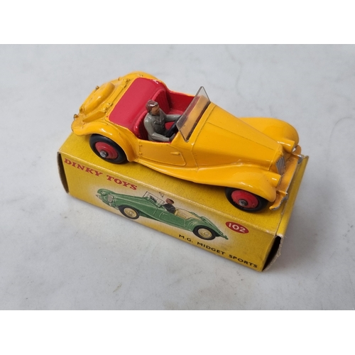 1239 - A boxed Dinky Toys No.102 dark yellow M.G. Midget Sports, Nr M-M, box nr perfect