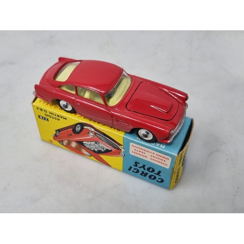 1285 - A boxed Corgi Toys No.218 red Aston Martin DB4, Nr M-M, box Ex plus