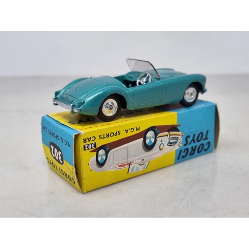 1299 - A boxed Corgi Toys No.302 metallic green MGA Sports Car with dished hubs, Nr M-M, box superb