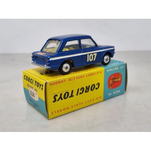 1311 - A boxed Corgi Toys No.328 Hillman Imp Monte-Carlo Rally Car, Nr M, slight loss of boot transfer, box... 