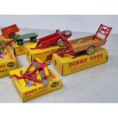 1321 - Six boxed Dinky Toys Farm Implements including No.320 Harvest Trailer, No.321 Massey-Harris Manure S... 