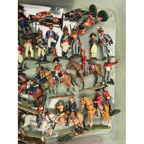 1344 - Fifty six Del Prado Cavalry Figures, twenty four Infantry Figures and two Gun Carriages