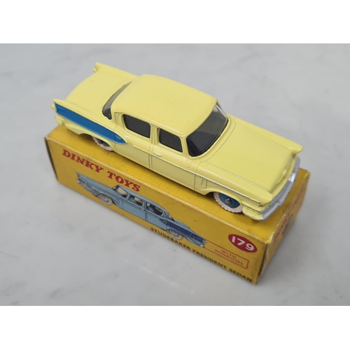 1382 - A boxed Dinky Toys No.179 yellow and blue Studebaker President Sedan, Ex, box Ex