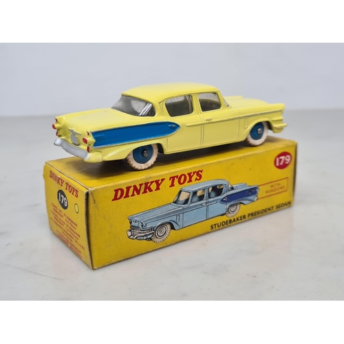 1382 - A boxed Dinky Toys No.179 yellow and blue Studebaker President Sedan, Ex, box Ex