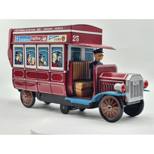 1387 - A battery operated tinplate Bus