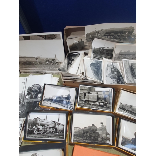 1399 - Four boxes containing an extensive collection of Photographs of mainly British steam locomotives and... 