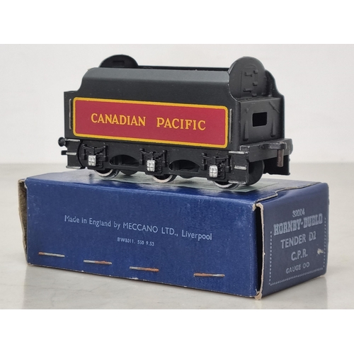 1030 - A rare boxed Hornby Dublo D2 C.P.R. Tender, almost certainly unused and in mint condition. Box in su... 