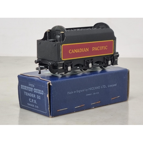 1030 - A rare boxed Hornby Dublo D2 C.P.R. Tender, almost certainly unused and in mint condition. Box in su... 