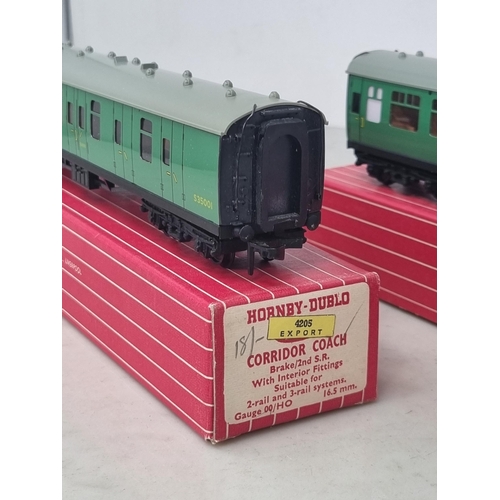 1032 - A boxed Hornby Dublo Export 4204 S.R. Corridor Coach and 4205 Export S.R. Corridor Coach, mint condi... 