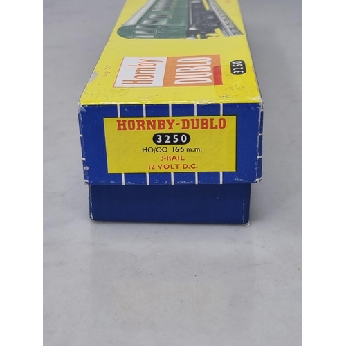 1033 - A boxed Hornby Dublo 3250 Electric Motor Coach in mint condition, has been lightly run. Box in excel... 