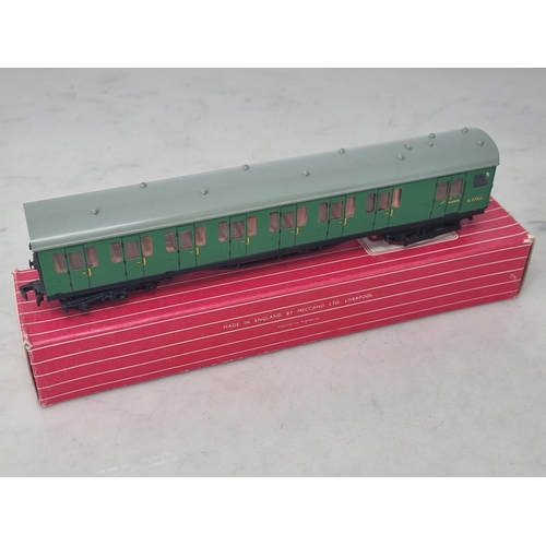 1035 - A boxed Hornby Dublo 4150 S.R. Trailer Coach in mint condition, has been lightly run. Box in near pe... 