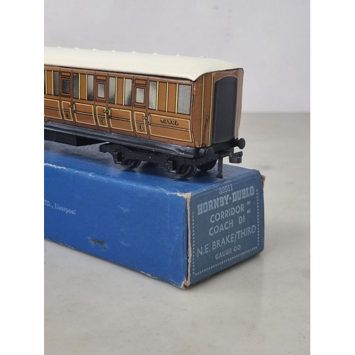 1038 - Two boxed Hornby Dublo D1 Corridor Coaches, 1/3rd and brake/3rd, near mint-mint condition. Brake box... 