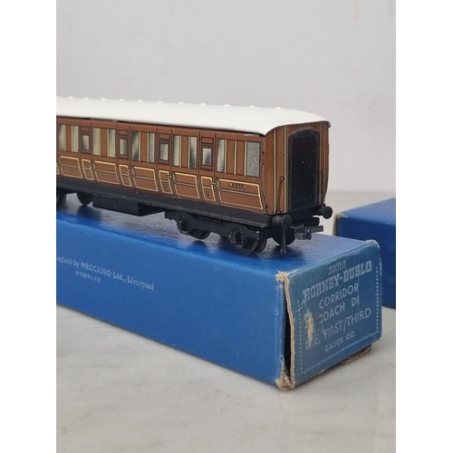 1038 - Two boxed Hornby Dublo D1 Corridor Coaches, 1/3rd and brake/3rd, near mint-mint condition. Brake box... 