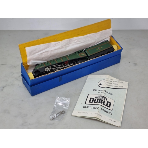 1040 - A boxed Hornby Dublo 3211 nickel silver 'Mallard' Locomotive, unused and in mint condition showing n... 