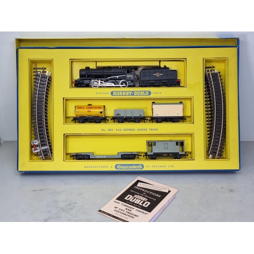 1043 - A boxed Hornby Dublo 2024 2-8-0 Express Goods Set, locomotive and wagons in near mint-mint condition... 