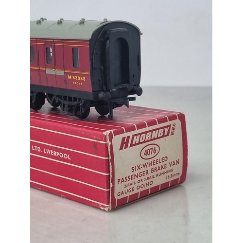 1044 - A boxed Hornby Dublo 4076 Six-wheel Passenger Brake Van, unused and in mint condition. Box in superb... 