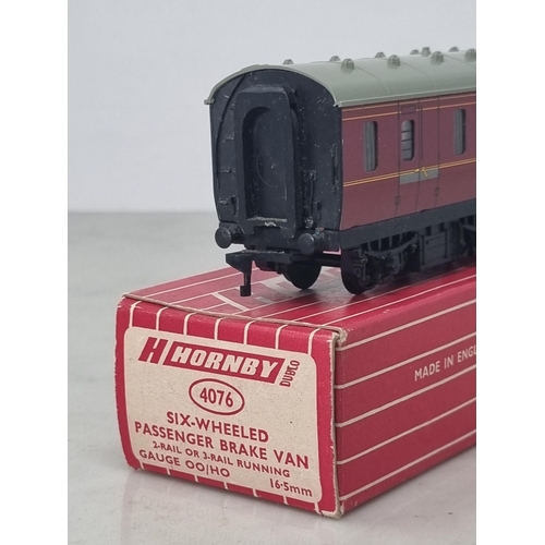 1044 - A boxed Hornby Dublo 4076 Six-wheel Passenger Brake Van, unused and in mint condition. Box in superb... 