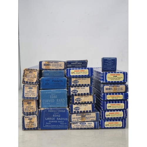 1048 - Twenty four boxes of Hornby Dublo 3-rail Track all in near mint condition comprising 1x EODPL (3732)... 