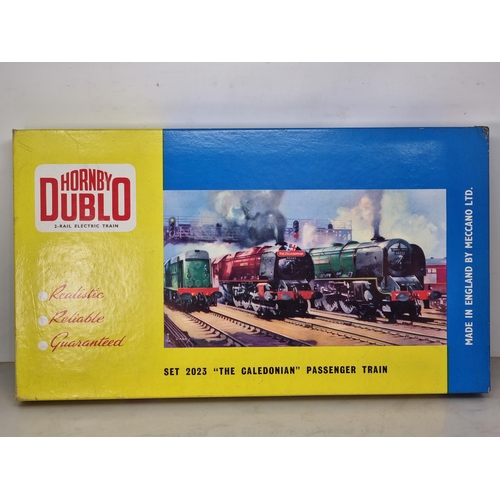 1049 - A boxed Hornby Dublo 2023 'The Caledonian' Passenger Set, mint, superb box. Locomotive in mint condi... 