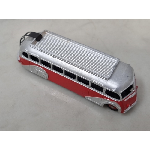 1019 - A French Dinky Toys 29E ISOBLOC red and silver Bus with rib type roof, mint condition. Ideal for lay... 