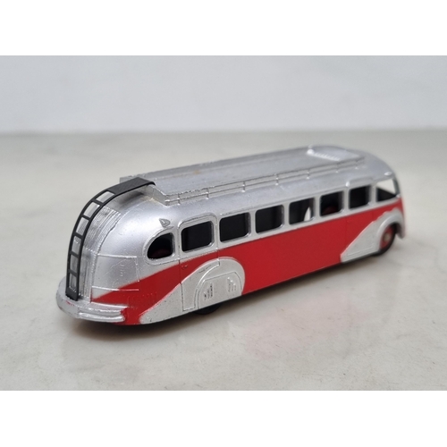 1019 - A French Dinky Toys 29E ISOBLOC red and silver Bus with rib type roof, mint condition. Ideal for lay... 