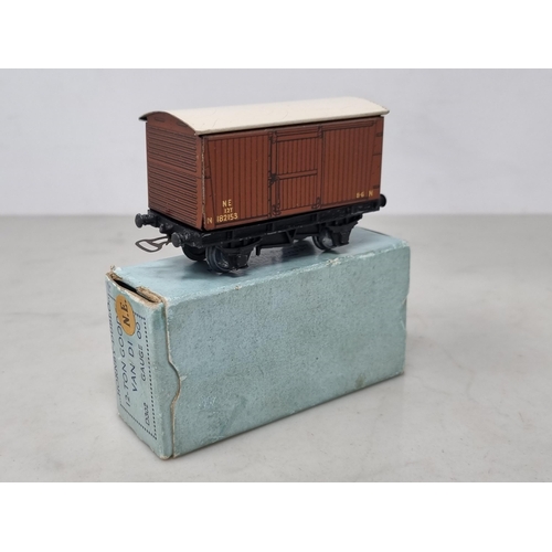 1021 - A boxed Hornby Dublo pre-war N.E. Goods Van in near mint condition. Chassis and wheels show no sign ... 