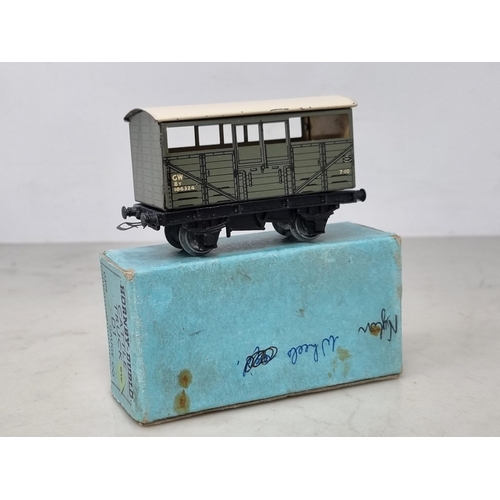 1027 - A boxed Hornby Dublo pre-war G.W.R. Cattle Truck in near mint condition, no fatigue to wheels or cha... 