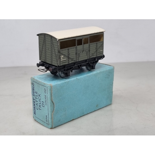 1027 - A boxed Hornby Dublo pre-war G.W.R. Cattle Truck in near mint condition, no fatigue to wheels or cha... 