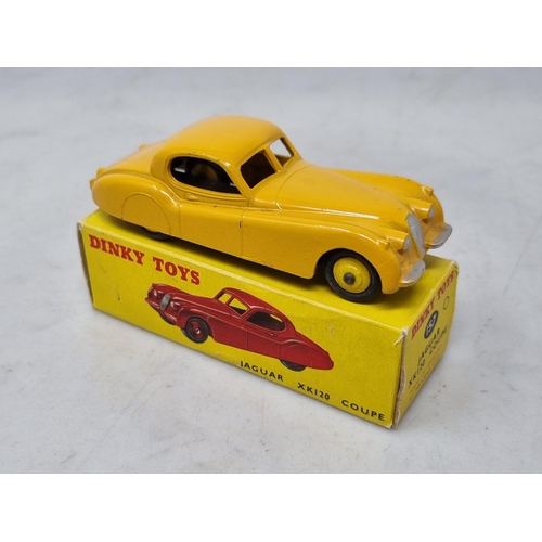 1243 - A boxed Dinky Toys No.157 yellow Jaguar XK120, Nr M-M, box Ex