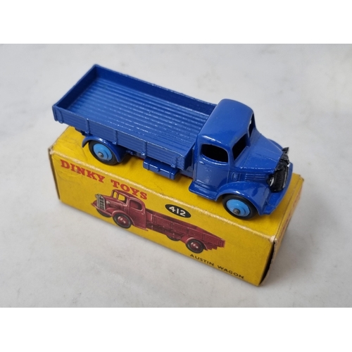 1258 - A boxed Dinky Toys No.412 blue Austin Covered Wagon, Nr M-M, box Ex