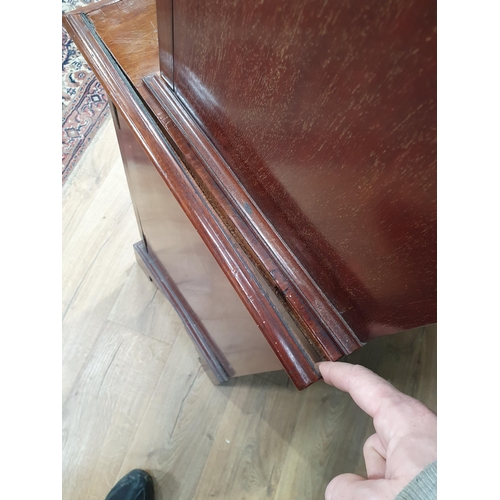 451 - A mahogany Bookcase with pair of astragal glazed doors enclosing adjustable shelves, the base fitted... 