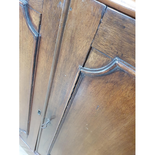 451 - A mahogany Bookcase with pair of astragal glazed doors enclosing adjustable shelves, the base fitted... 