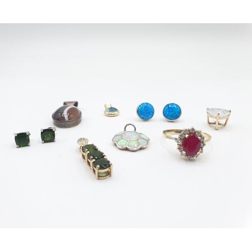 183 - A Diopside three stone Pendant in 9ct gold, a pair of Diopside Ear Studs each claw-set round stone i... 