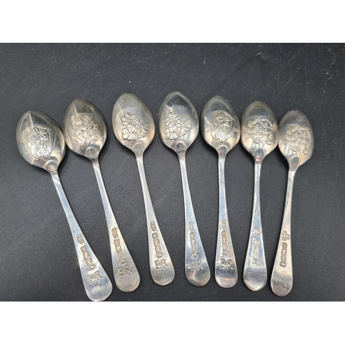 128 - Seven Elizabeth II silver Teaspoons with various pattern backs, Sheffield 1977