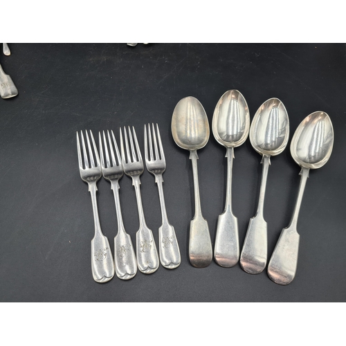 129 - Four Victorian silver Teaspoons fiddle pattern engraved initials, Exeter 1844, four various Spoons, ... 