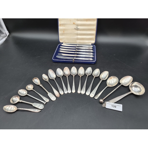 139 - Eight Georgian silver Teaspoons, six various silver Spoons, six silver hafted Tea Knives in case, an... 