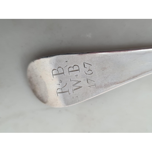 145 - A Georgian silver bottom marked Table Spoon Hanoverian pattern engraved initials and date 1767, and ... 