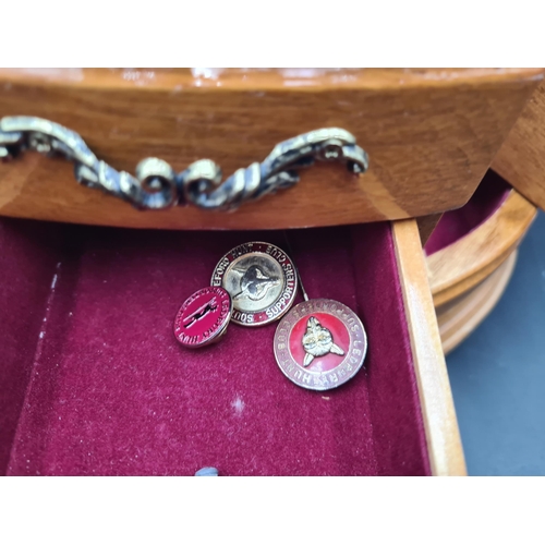 148 - A Jewellery Cabinet with hinged lid inset mirror, fitted drawers and hinged sides containing Costume... 