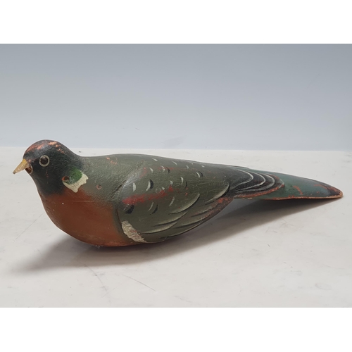 15 - A carved and painted Pigeon Decoy with glass eyes and spring underneath, A/F, and another painted Pi... 