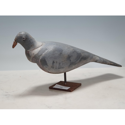 15 - A carved and painted Pigeon Decoy with glass eyes and spring underneath, A/F, and another painted Pi... 