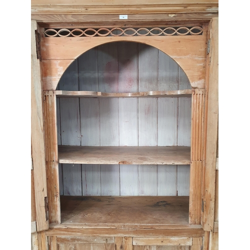 16 - An antique pine Cupboard fitted four panelled doors A/F 6ft 10in H x 5ft 6in W (R11)