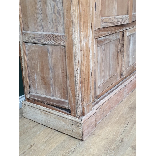 16 - An antique pine Cupboard fitted four panelled doors A/F 6ft 10in H x 5ft 6in W (R11)