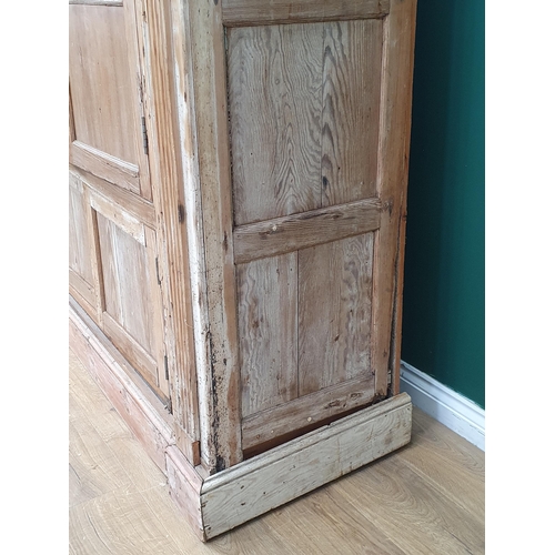 16 - An antique pine Cupboard fitted four panelled doors A/F 6ft 10in H x 5ft 6in W (R11)