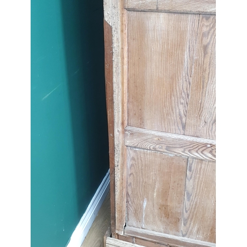 16 - An antique pine Cupboard fitted four panelled doors A/F 6ft 10in H x 5ft 6in W (R11)