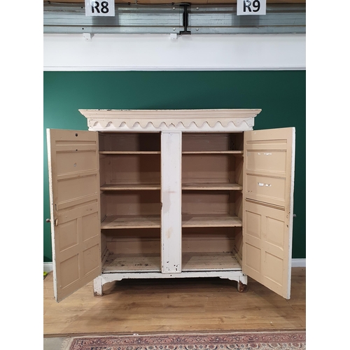 17 - An antique white painted oak two door Cupboard utilising 17th Century and later elements 5ft 9in H x... 