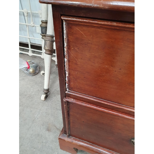 18 - A 19th Century mahogany Linen Press fitted pair of doors above base fitted two short and one long dr... 